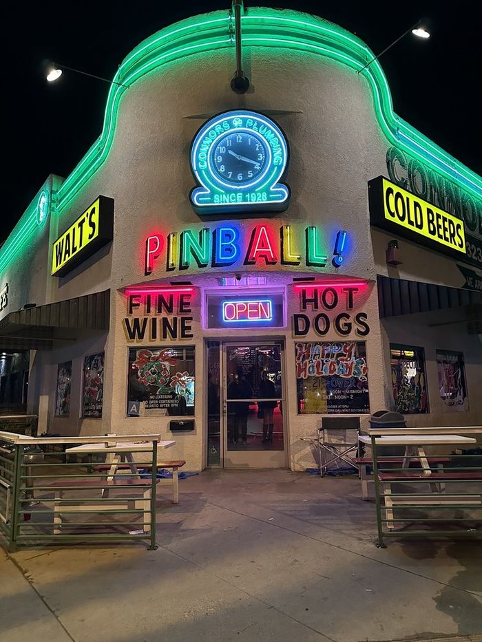 Our corner at night with the neon signs lit